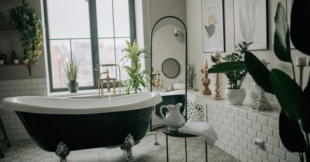 Contemporary bathroom renovation with freestanding bath and natural greenery